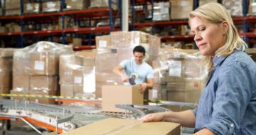 People working shipping orders in warehouse