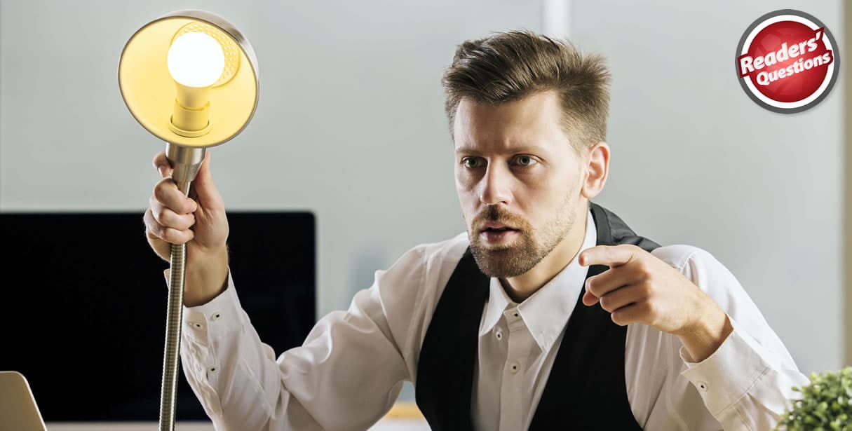 Man asking questions with lamp