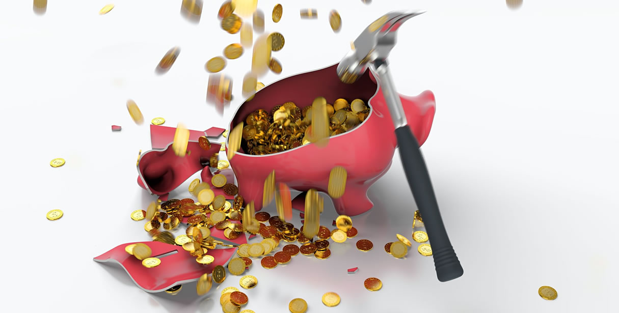 Hammer smashing piggybank
