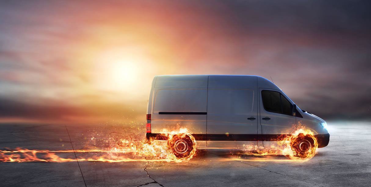 Van with wheels on fire