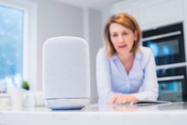 Woman shopping on smart speaker