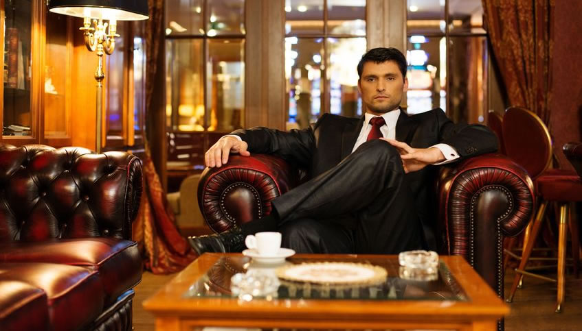 Man in expensive suit in luxurious room