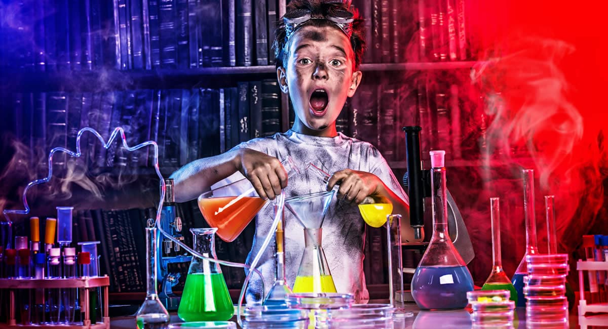 Boy doing chemistry experiment