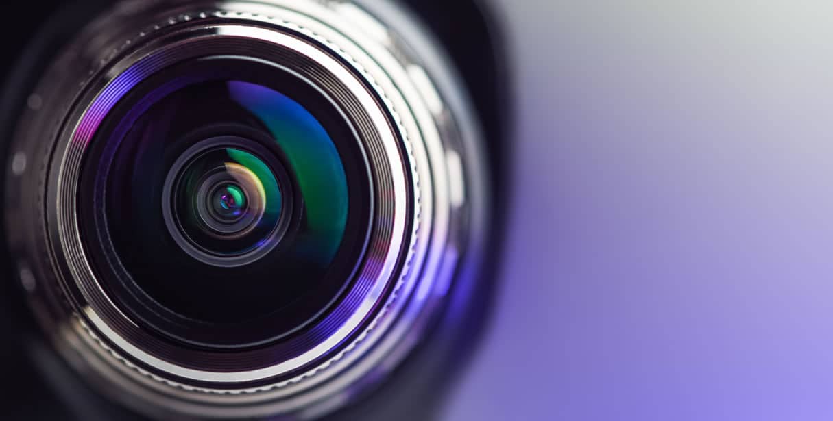 Camera lens pointing at viewer