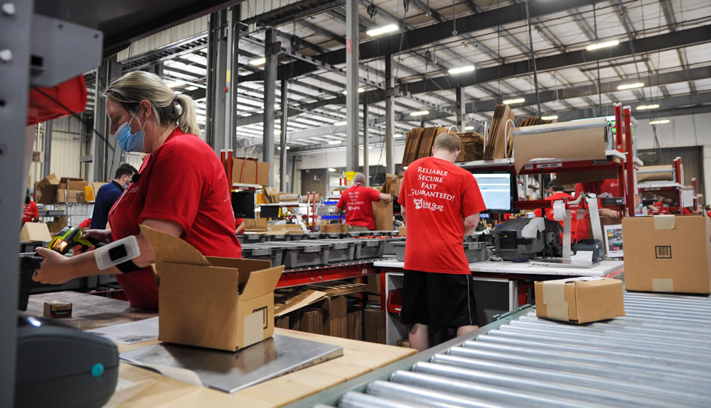 Packing station at a warehouse